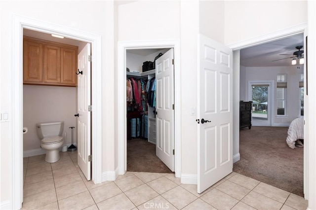 395 Mesa Rd, Nipomo, CA 93444 - bathroom featuring tile patterned flooring, a ceiling fan, and a walk in closet