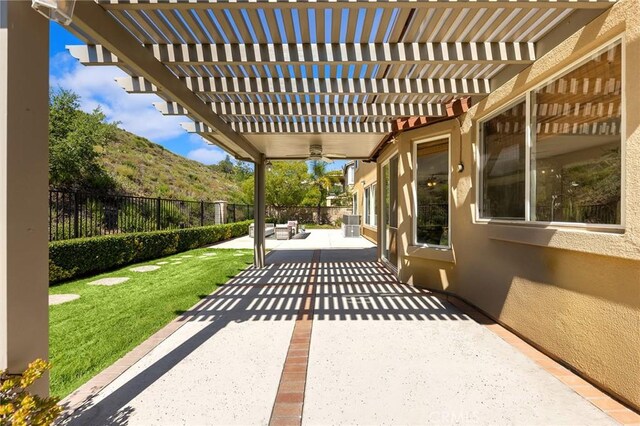 23665 Ridgecrest Ct, Diamond Bar, CA 91765 - fenced backyard with a mountain view, a patio area, and a pergola