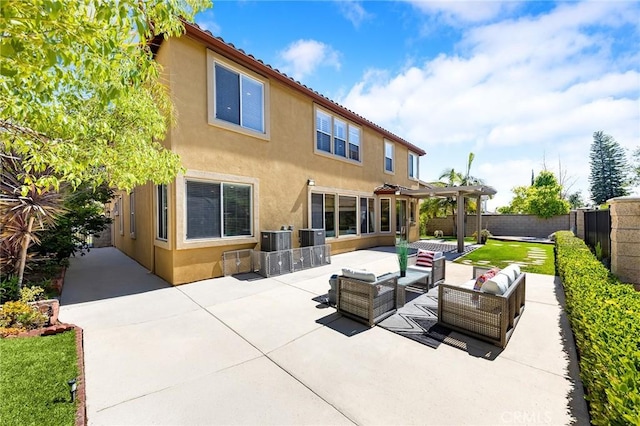 23665 Ridgecrest Ct, Diamond Bar, CA 91765 - back of property with an outdoor hangout area, a pergola, stucco siding, and a fenced backyard