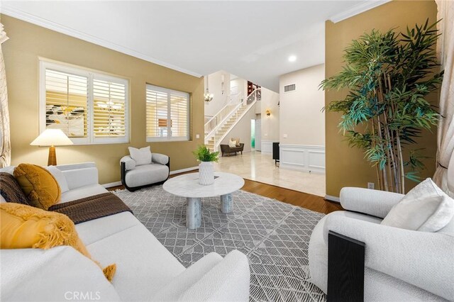 23665 Ridgecrest Ct, Diamond Bar, CA 91765 - living room with ornamental molding, stairs, wood finished floors, wainscoting, and recessed lighting