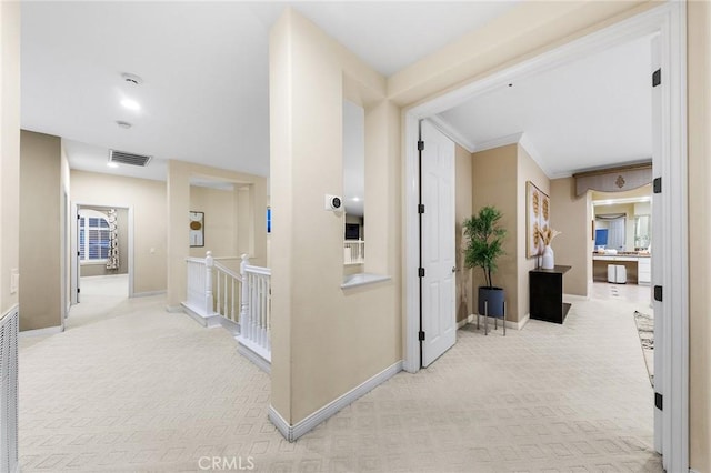 23665 Ridgecrest Ct, Diamond Bar, CA 91765 - hallway featuring carpet, ornamental molding, and an upstairs landing