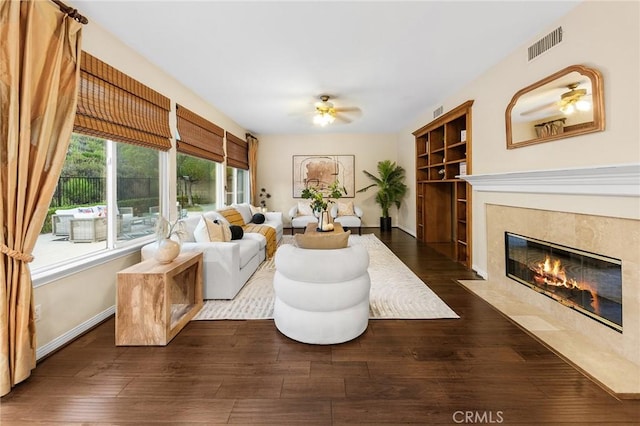 23665 Ridgecrest Ct, Diamond Bar, CA 91765 - living room with a high end fireplace, ceiling fan, and dark wood-type flooring