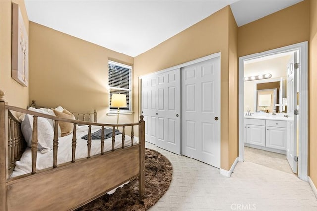 23665 Ridgecrest Ct, Diamond Bar, CA 91765 - bedroom featuring a closet, light colored carpet, and connected bathroom