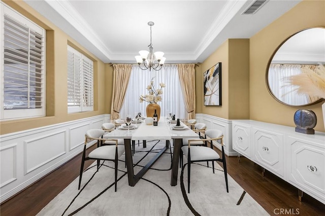 23665 Ridgecrest Ct, Diamond Bar, CA 91765 - dining room featuring wood finished floors, a decorative wall, a chandelier, wainscoting, and crown molding