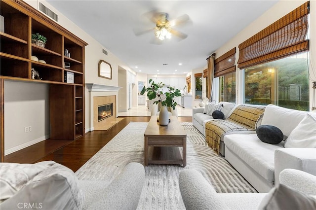 23665 Ridgecrest Ct, Diamond Bar, CA 91765 - living area featuring wood finished floors, ceiling fan, a high end fireplace, and recessed lighting