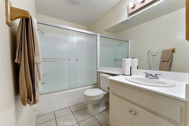 23326 Sesame St Unit E, Torrance, CA 90502 - full bathroom with vanity, tile patterned floors, and bath / shower combo with glass door