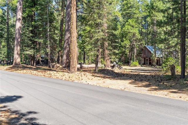 7472 Humboldt Rd, Butte Meadows, CA 95942 - view of asphalt street featuring a forest view