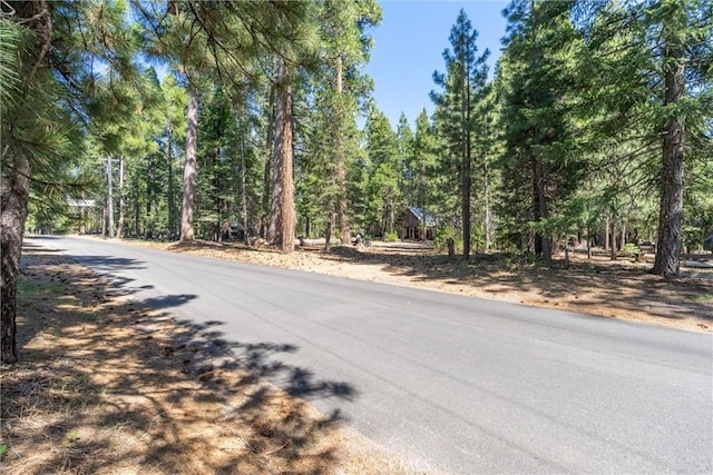 7472 Humboldt Rd, Butte Meadows, CA 95942 - view of asphalt street with a forest view