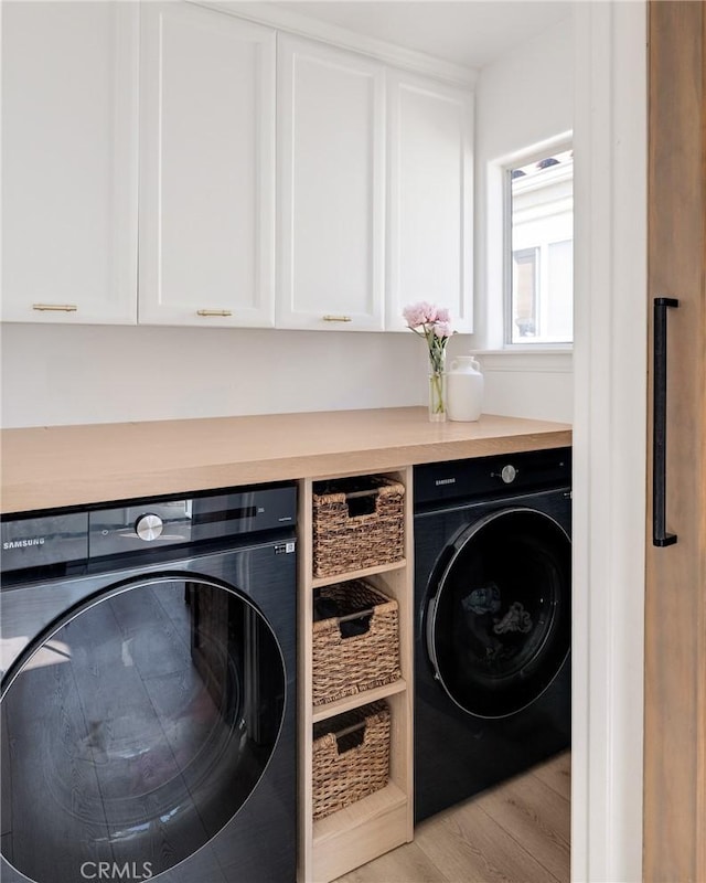 1722 Harper Ave, Redondo Beach, CA 90278 - laundry room featuring washer and dryer, light wood finished floors, and cabinet space