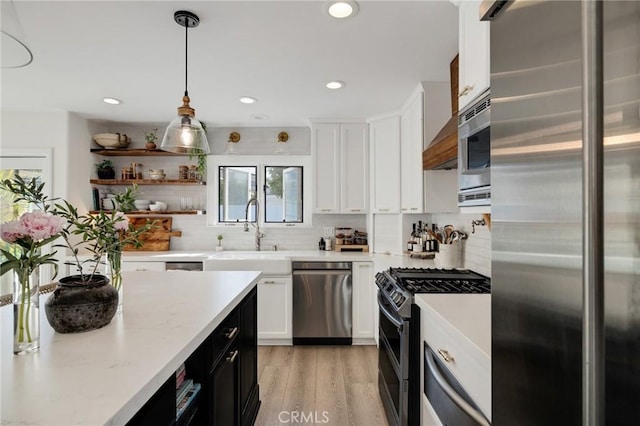 1722 Harper Ave, Redondo Beach, CA 90278 - kitchen featuring appliances with stainless steel finishes, white cabinets, backsplash, and recessed lighting