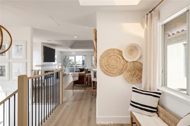 1722 Harper Ave, Redondo Beach, CA 90278 - corridor with an upstairs landing, wood finished floors, a raised ceiling, and recessed lighting