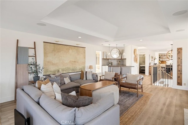 1722 Harper Ave, Redondo Beach, CA 90278 - living area with a raised ceiling, light wood-style flooring, and recessed lighting