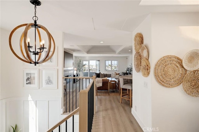 1722 Harper Ave, Redondo Beach, CA 90278 - hallway featuring an upstairs landing, light wood-style flooring, a chandelier, recessed lighting, and coffered ceiling
