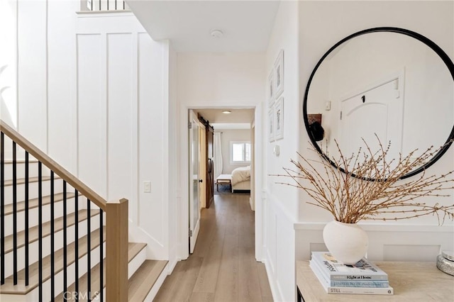 1722 Harper Ave, Redondo Beach, CA 90278 - hallway featuring light wood finished floors and stairway