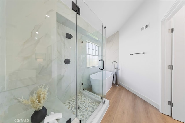 25885 Astor Way, Lake Forest, CA 92630 - full bathroom with a freestanding bath, wood finished floors, and a marble finish shower