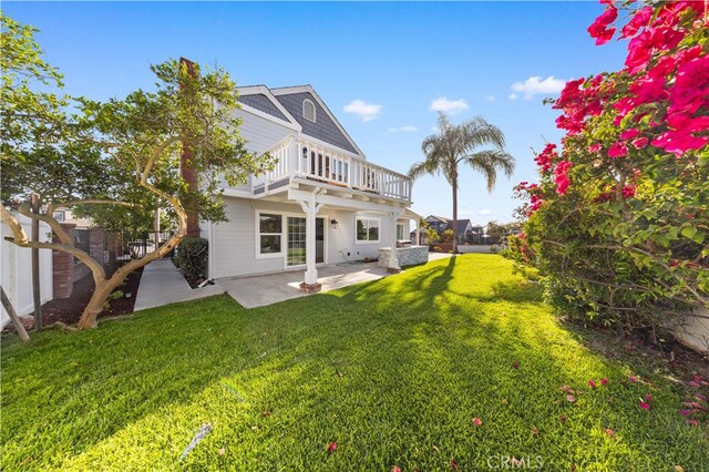 25885 Astor Way, Lake Forest, CA 92630 - rear view of property featuring a balcony, a patio area, and a fenced backyard