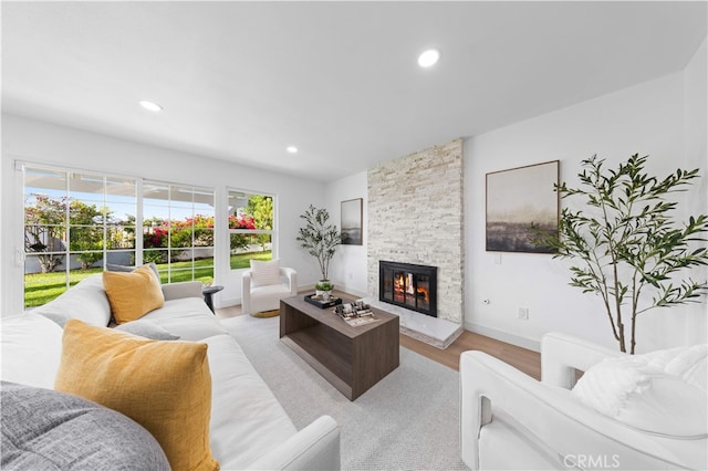 25885 Astor Way, Lake Forest, CA 92630 - living area with light wood-style flooring, a fireplace, and recessed lighting