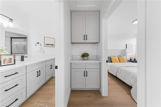 25885 Astor Way, Lake Forest, CA 92630 - ensuite bathroom featuring vanity and wood finished floors