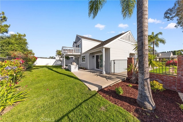 25885 Astor Way, Lake Forest, CA 92630 - rear view of house featuring a fenced backyard, a patio area, and a balcony