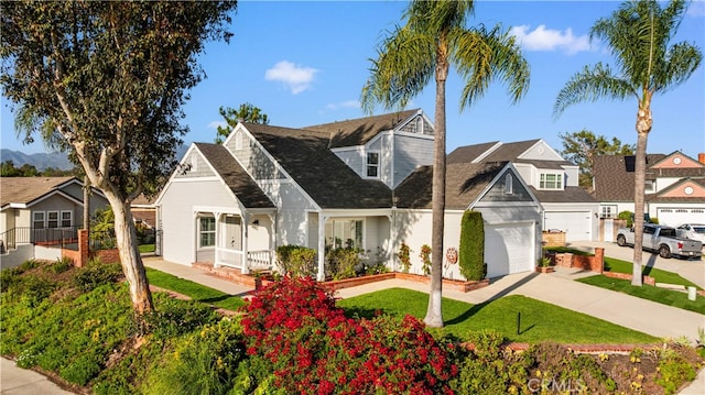 25885 Astor Way, Lake Forest, CA 92630 - view of front of house featuring concrete driveway, a residential view, a garage, a front yard, and a shingled roof