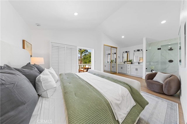 25885 Astor Way, Lake Forest, CA 92630 - bedroom with light wood-type flooring, lofted ceiling, recessed lighting, and ensuite bath