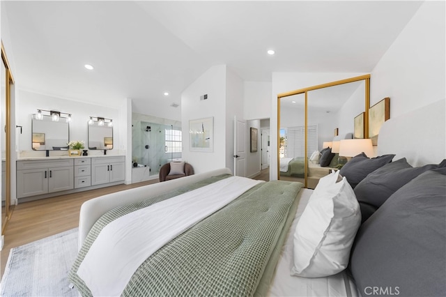 25885 Astor Way, Lake Forest, CA 92630 - bedroom featuring lofted ceiling, recessed lighting, ensuite bathroom, a closet, and light wood-style floors