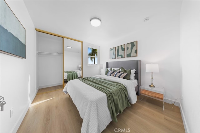 25885 Astor Way, Lake Forest, CA 92630 - bedroom with wood finished floors and a closet