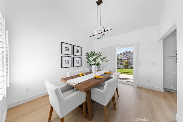 25885 Astor Way, Lake Forest, CA 92630 - dining area with light wood-type flooring and a chandelier