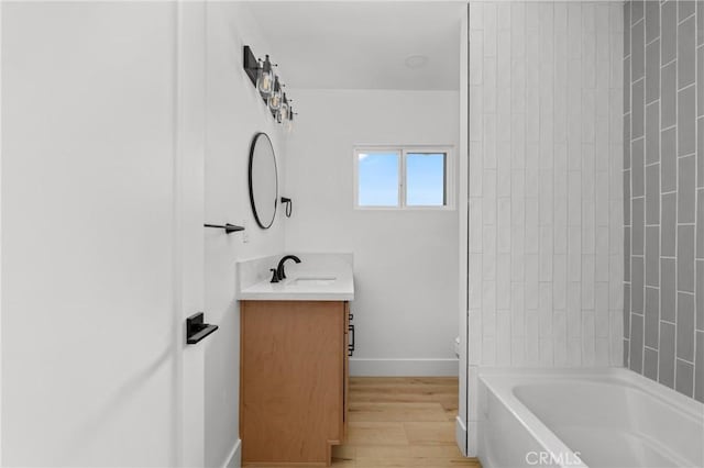 151 Barret Rd, Riverside, CA 92507 - full bath with vanity, wood finished floors, and tub / shower combination