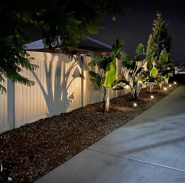 1349 Pyramid Peak St, Chula Vista, CA 91913 - yard at night featuring a fenced backyard