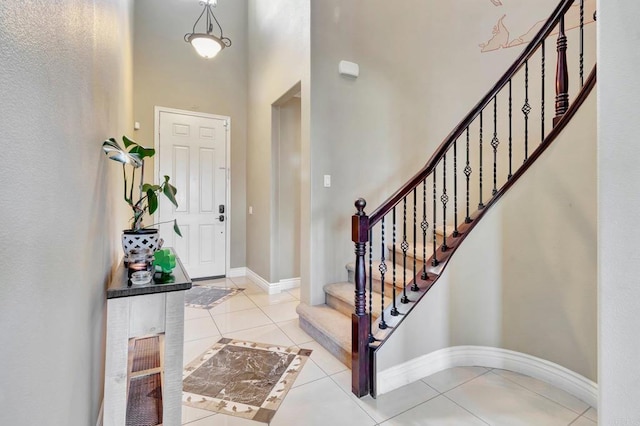 1349 Pyramid Peak St, Chula Vista, CA 91913 - foyer featuring tile patterned floors, a high ceiling, and stairs