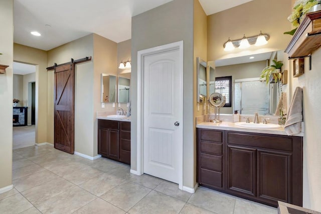 1349 Pyramid Peak St, Chula Vista, CA 91913 - full bathroom featuring two vanities, tile patterned floors, and a shower