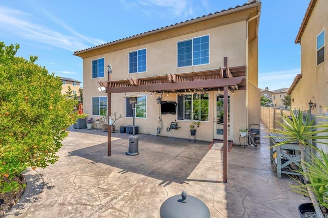 1349 Pyramid Peak St, Chula Vista, CA 91913 - back of house featuring stucco siding, a pergola, and a patio