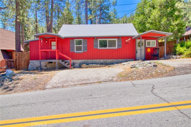 1815 Thrush Rd, Wrightwood, CA 92397 - rustic home featuring a shingled roof and board and batten siding