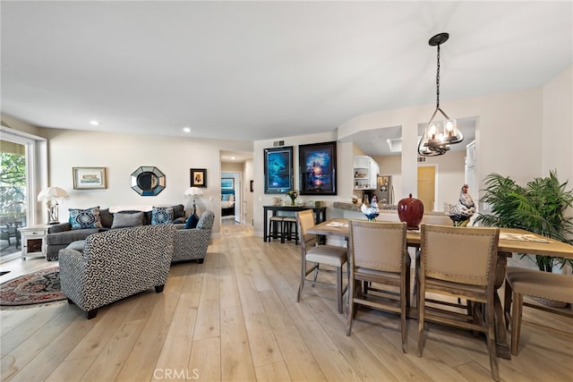 29 Baycrest Ct Unit 16, Newport Beach, CA 92660 - dining space with a chandelier, light wood-style flooring, and recessed lighting