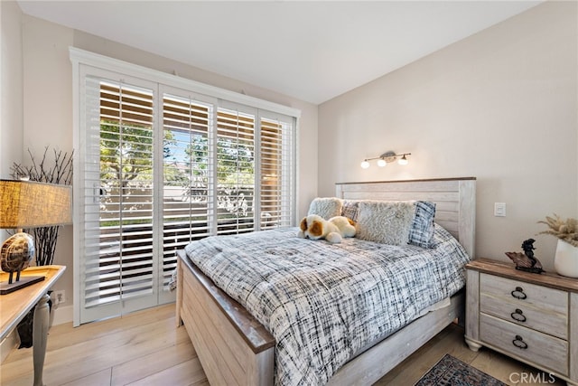 29 Baycrest Ct Unit 16, Newport Beach, CA 92660 - bedroom with light wood-style floors
