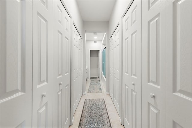29 Baycrest Ct Unit 16, Newport Beach, CA 92660 - corridor featuring light tile patterned floors and baseboards