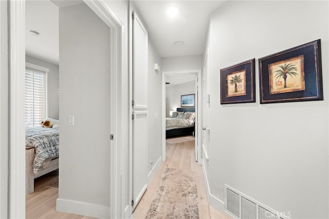 29 Baycrest Ct Unit 16, Newport Beach, CA 92660 - hall featuring light wood-type flooring and baseboards