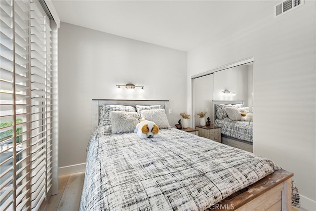 29 Baycrest Ct Unit 16, Newport Beach, CA 92660 - bedroom featuring wood finished floors and a closet