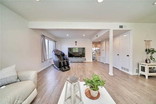 16011 Sugarpine Ln, Cerritos, CA 90703 - living area with light wood finished floors and recessed lighting