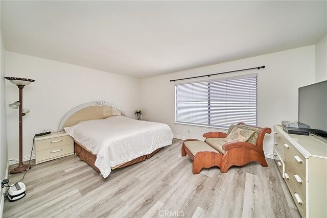 16011 Sugarpine Ln, Cerritos, CA 90703 - bedroom featuring light wood-style floors and baseboards