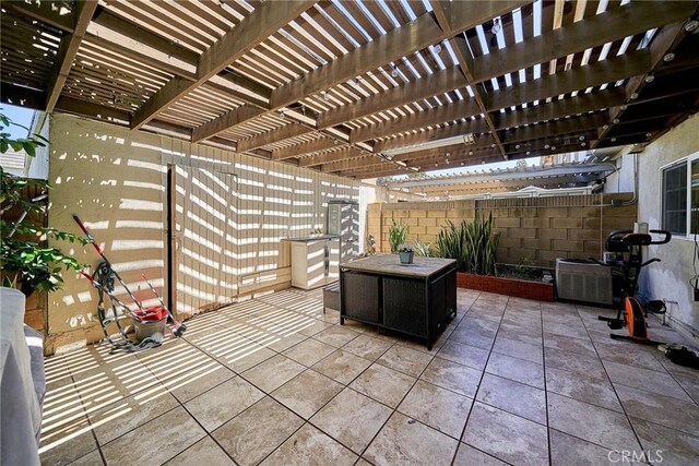 16011 Sugarpine Ln, Cerritos, CA 90703 - fenced backyard with a patio area and a pergola