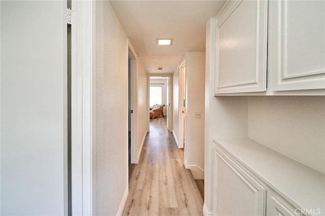 16011 Sugarpine Ln, Cerritos, CA 90703 - hall featuring light wood-type flooring and baseboards