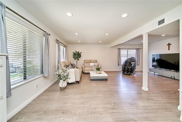 16011 Sugarpine Ln, Cerritos, CA 90703 - living area with light wood-type flooring, recessed lighting, and ornate columns