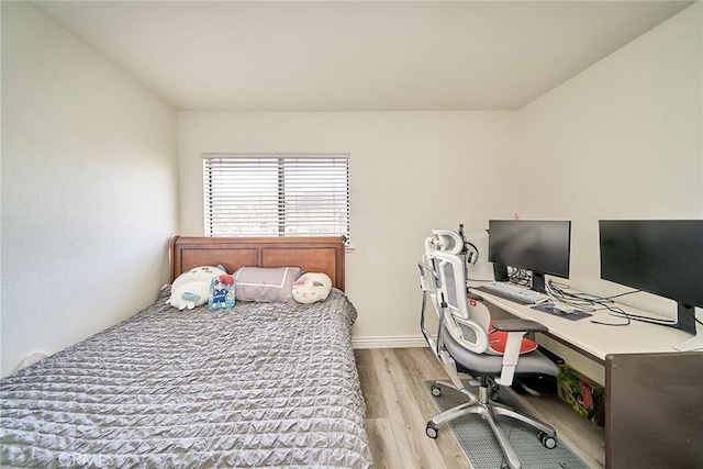 16011 Sugarpine Ln, Cerritos, CA 90703 - bedroom featuring light wood-style floors and a desk