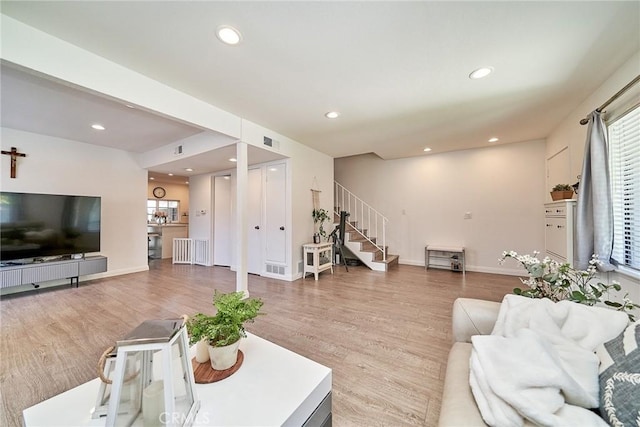16011 Sugarpine Ln, Cerritos, CA 90703 - living room with stairway, wood finished floors, and recessed lighting
