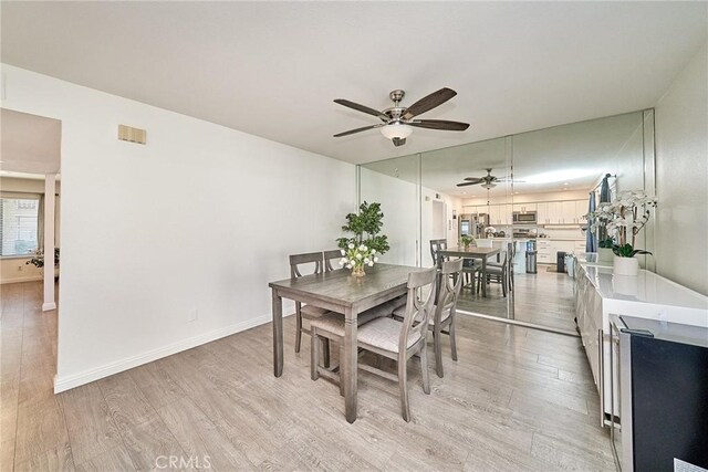 16011 Sugarpine Ln, Cerritos, CA 90703 - dining room featuring ceiling fan and light wood-style flooring