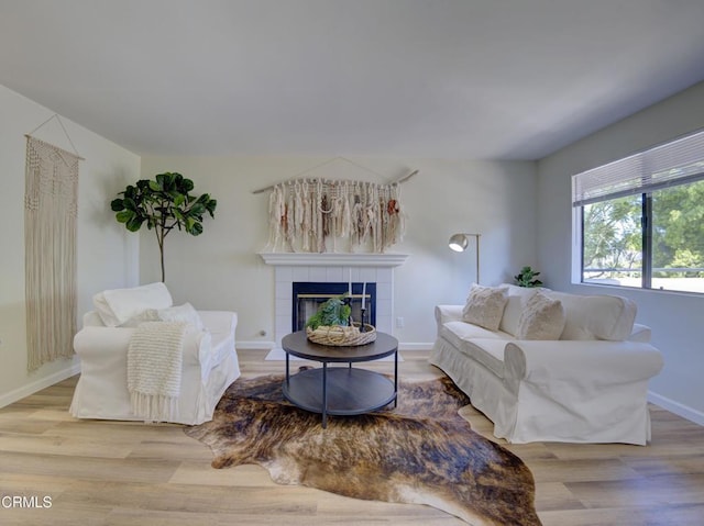 644 Orwell Ln, Ventura, CA 93003 - living area with wood finished floors and a fireplace