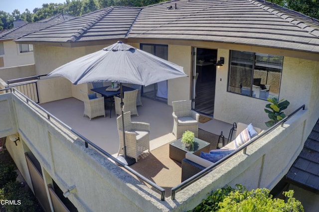 644 Orwell Ln, Ventura, CA 93003 - rear view of property with stucco siding, a tile roof, and a patio