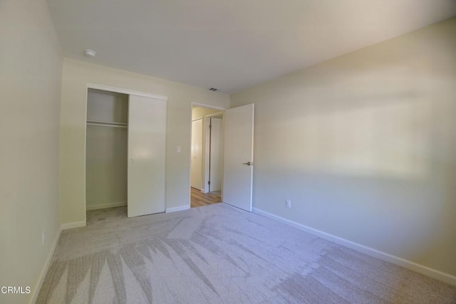 644 Orwell Ln, Ventura, CA 93003 - unfurnished bedroom with light colored carpet and a closet